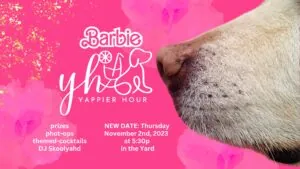 Close-up of a dogs nose on a pink floral background with text about a Barbie-themed Yappier Hour event on November 2nd, 2023, at 5:30pm.